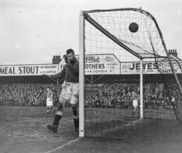 The ball flies over the bar