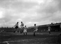 Albert Dawes wins this heading duel