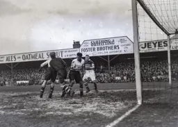 Eddie Parris challenges the goalkeeper
