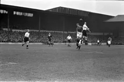 Eddie Connelly is beaten to the ball