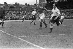 Billy Waugh sees the ball drift out