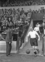 Horace Gager leads the team out