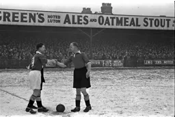 Skipper Horace Gager shakes hands before the start