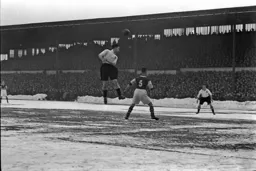 Hugh Billington heads across goal