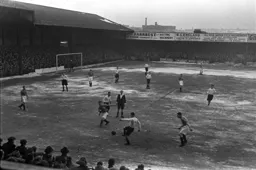 Wally Shanks plays the ball forward