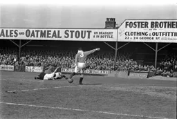 Allen Driver is brought down in the area by City goalkeeper Frank Swift