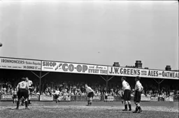 Everyone watches as the ball goes over the top