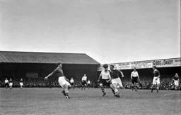 A Leicester defender clears the ball