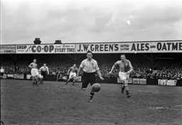 Ted Duggan latches on to a loose ball