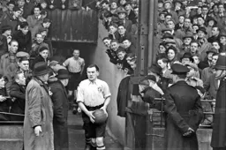 New skipper Frank Soo leads the team out