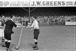 Doug Gardiner about to toss the coin