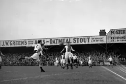 Peter Small heads towards goal