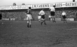 Billy Arnison powers in a header