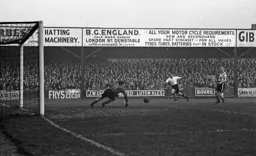 Tom Kiernan bangs in the Town's first goal