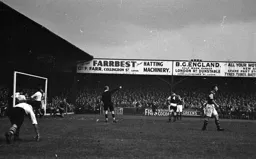 Happy Hatters in the goalmouth after Arnison's goal