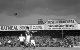 Bobby Brennan watches as the ball is headed clear