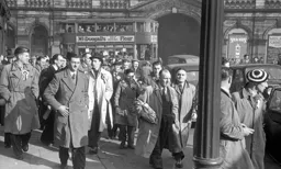 Luton supporters make their way to the game from the station