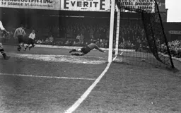 Brennan (out of shot) nets for the Town