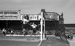 Bobby Brennan tries to get his head to the ball