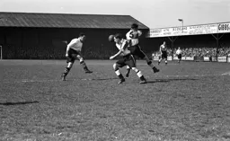 Tom Kiernan tries to thread the ball through