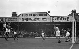 Jim Mulvaney wins this heading duel