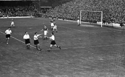 Peter Walsh is congratulated by his colleagues