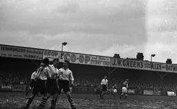 Billy Waugh is congratulated on his goal