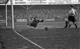 Billy Waugh tries to force the ball home