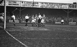 The QPR goalkeeper tips the ball over the bar