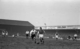 George Stobbart in a chase for the ball