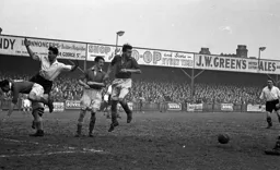 Another scramble in the Bury goalmouth