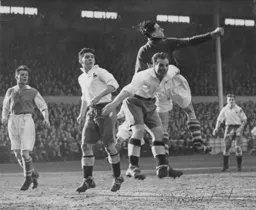 Iorwerth Hughes punches the ball clear