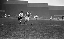 George Stobbart in a race for the ball