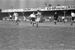 Charlie Watkins prevents the ball from being cleared