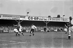 The Swans goalkeeper gathers the ball