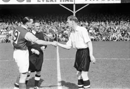 Skipper Syd Owen and his Notts County counterpart Tommy Lawton before the start