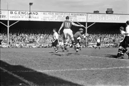 The Notts goalkeeper gathers the ball