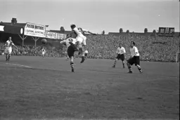 George Stobbart is beaten to the ball