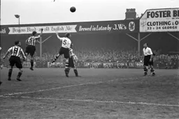 Syd Owen goes up for a corner