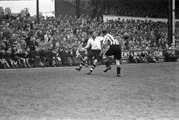 Roy Davies tries to beat his full-back