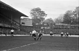 Syd Owen puts in a cross