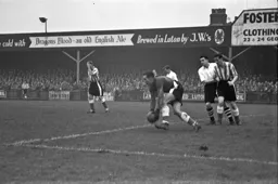 The Owls goalkeeper about to clear upfield