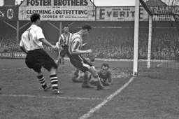 The Owls goalkeeper clutches the ball