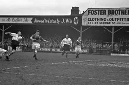 The ball whistles past everyone