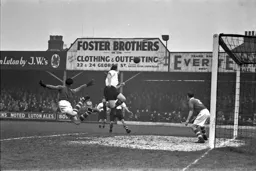 Roy Davies heads over