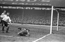 The Bess goalkeeper smothers the ball