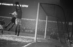 The Swindon goalkeeper clutches the ball