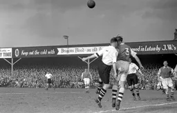 Roy Davies in a heading duel