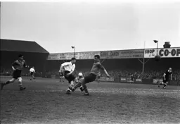 Bernard Moore fires home past Leeds centre-half John Charles