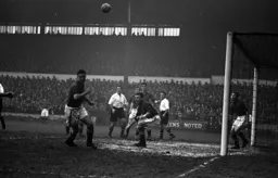 Leeds defenders have their eyes on the ball. Jesse Pye and Charlie Watkins await developments